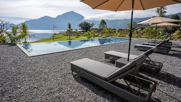 Outdoor pool, pool umbrellas, pool loungers