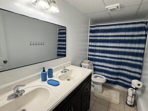 Hair dryer, towels, soap, toilet paper