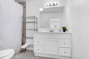 Hair dryer, towels, soap, toilet paper