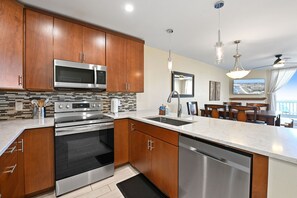 Coffee/tea maker, fridge, microwave, oven