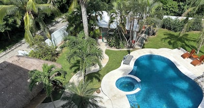 Four Bedrooms and large private pool steps from Paradise Beach
