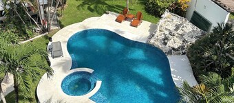 Four Bedrooms and large private pool steps from Paradise Beach