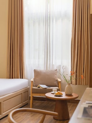 Quarto quƔdruplo superior, vista para o jardim | Comodidades do quarto