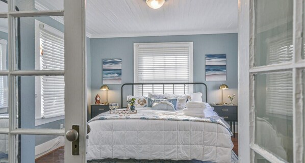 1 bedroom, desk, iron/ironing board, travel crib