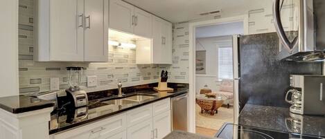 Fridge, microwave, coffee/tea maker, toaster