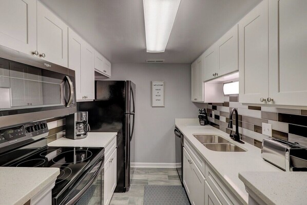 Fridge, microwave, coffee/tea maker, toaster