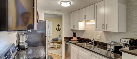 Fridge, microwave, coffee/tea maker, toaster