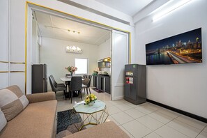 Deluxe Apartment, Balcony | Living area