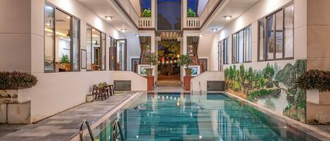 Outdoor pool, pool umbrellas, pool loungers