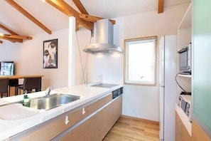 Fridge, microwave, coffee/tea maker, highchair