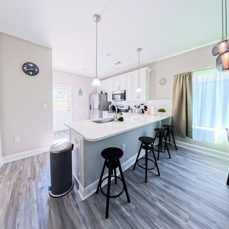 Fridge, microwave, oven, stovetop. Charming 3-bedroom house in terrific Charlotte and close to Uptown