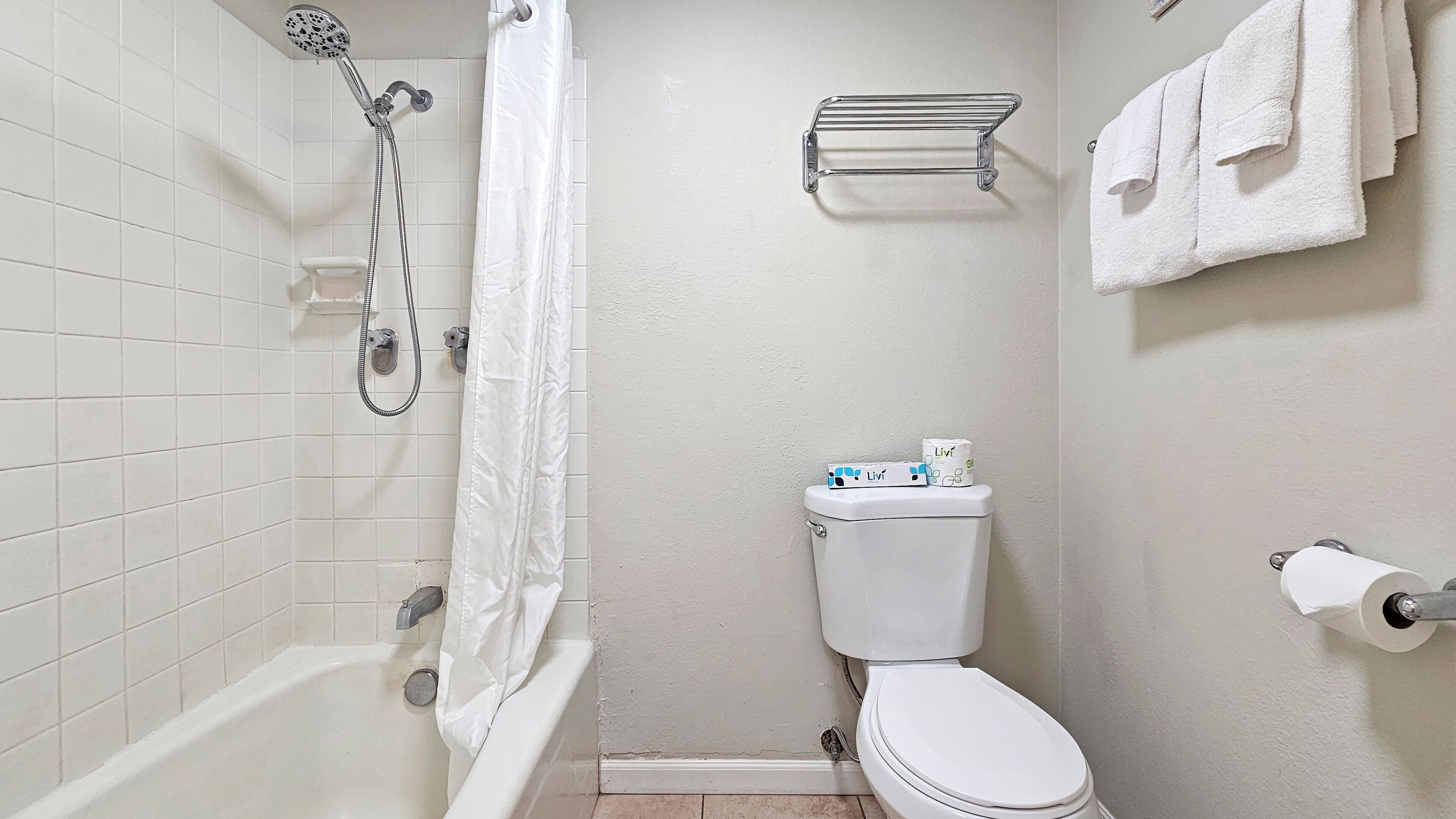 Hair dryer, towels, soap, shampoo