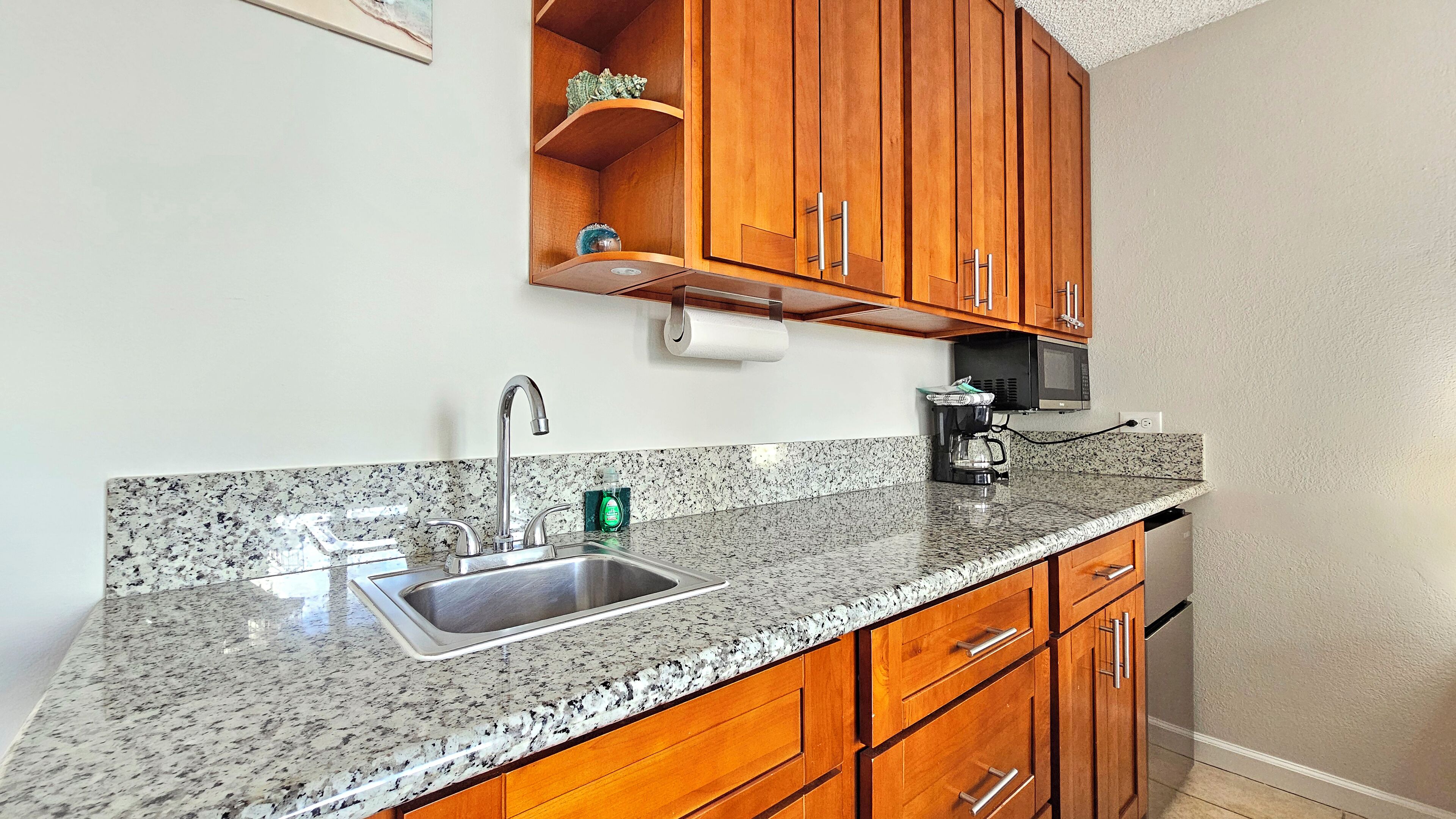 Fridge, microwave, stovetop, coffee/tea maker