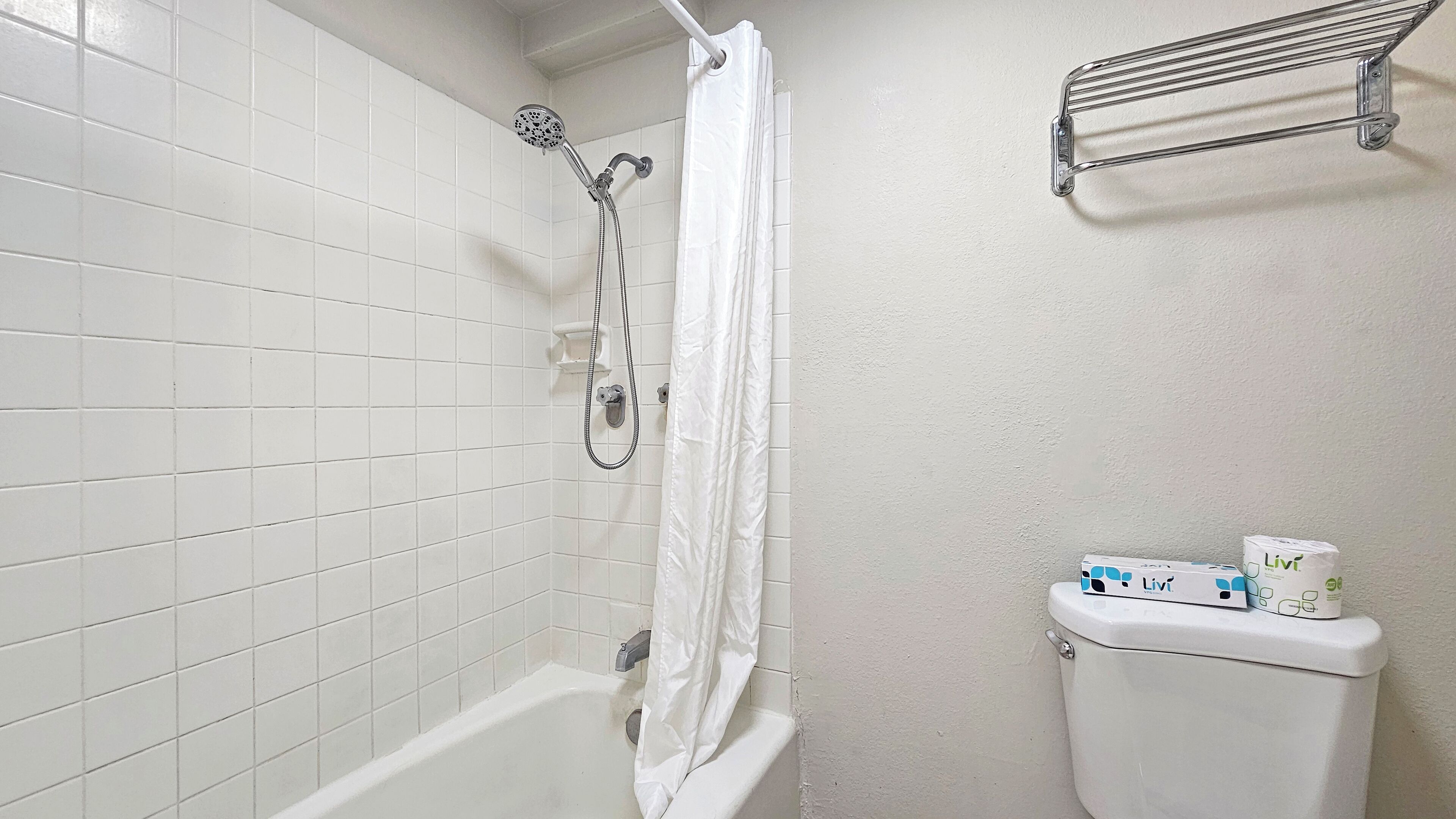 Hair dryer, towels, soap, shampoo