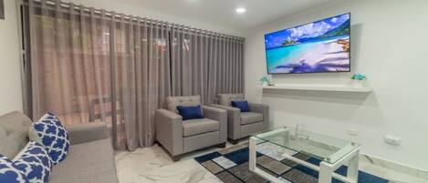 Luxury Condo | Living area | Computer monitors