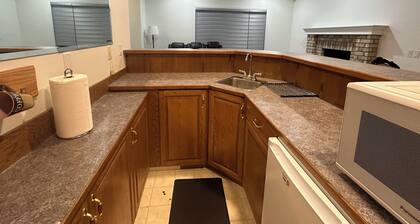 Delightful ground level basement with AC in charming Chestermere