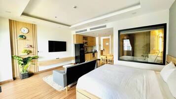 Deluxe Room, Balcony, Beach View | Individually furnished, desk, laptop workspace, blackout drapes