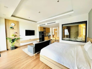 Deluxe Room, Balcony, Beach View | Desk, laptop workspace, blackout drapes, soundproofing