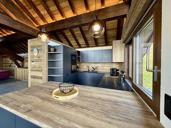 Fridge, cookware/dishes/utensils, dining tables