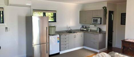 Fridge, microwave, electric kettle, toaster