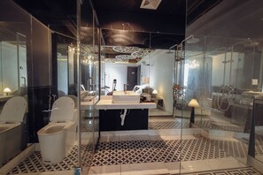 Panoramic Studio Suite, 1 Queen Bed, City View | Bathroom | Hair dryer, slippers, bidet, soap - Love in the Atlantis Hotel (Ha Noi)