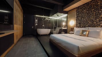 Suite estudio Deluxe, 1 cama de matrimonio, bañera | Espacio para trabajar con un portátil, wifi gratis, ropa de cama