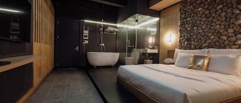 Suite estudio Deluxe, 1 cama de matrimonio, bañera | Espacio para trabajar con un portátil, wifi gratis, ropa de cama