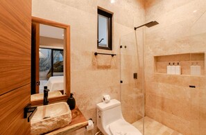 Shower, hair dryer, towels, toilet paper