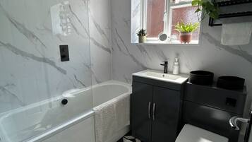 Hair dryer, towels, soap, toilet paper