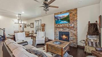 TV, fireplace, books, offices