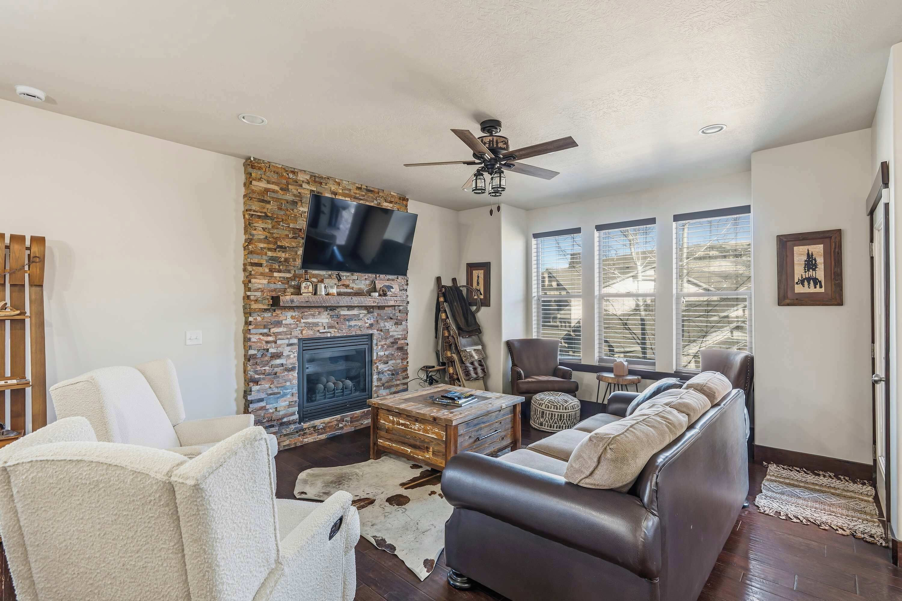 TV, fireplace, books, offices