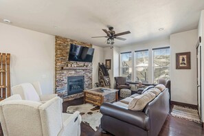 TV, fireplace, books, offices