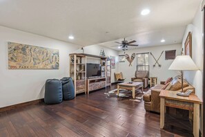 TV, fireplace, books, offices