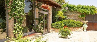 Villa Petruzia: A spacious and welcoming two-story residence surrounded by the greenery and facing the Dolomiti Lucane mountains, with Free WI-FI.