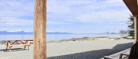 On the beach, sun-loungers, beach towels