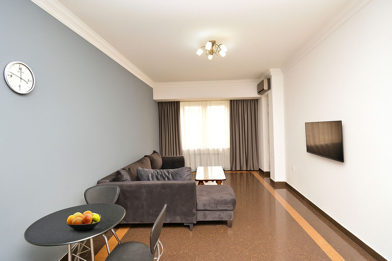 Comfort Apartment, Balcony, Garden View | Living area | 50-inch flat-screen TV with cable channels