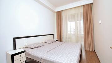 Classic Apartment, 1 Bedroom, Balcony, Garden View | Premium bedding, laptop workspace, blackout curtains, iron/ironing board