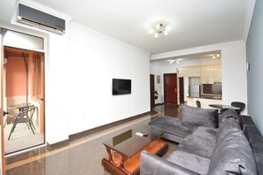 Comfort Apartment, Balcony, Garden View | Living area | 50-inch flat-screen TV with cable channels - Apartments by Luxe Group BU944 (Yerevan)