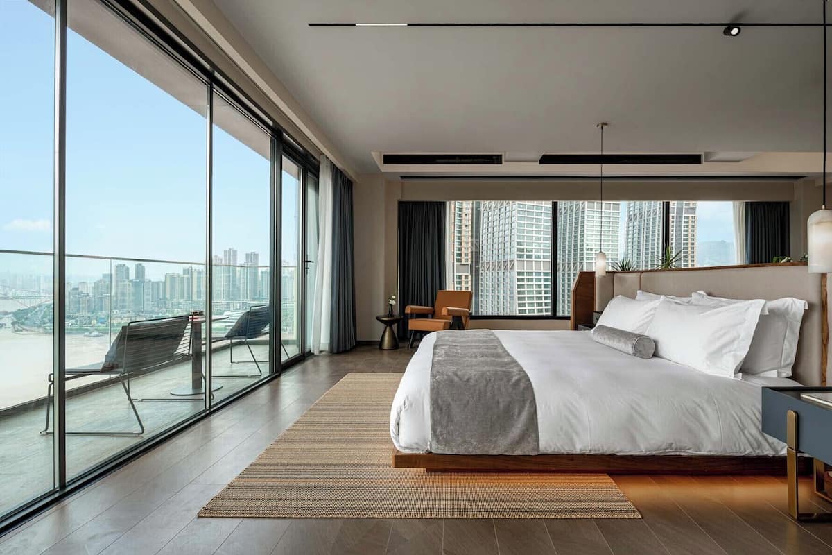 Luxury Suite, City View | Premium bedding, down comforters, minibar, individually decorated