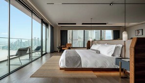 Luxury Suite, City View | Premium bedding, down comforters, minibar, individually decorated
