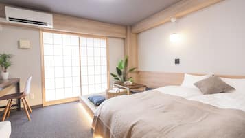 Family Apartment, Balcony, City View | Blackout drapes, iron/ironing board, free WiFi, bed sheets