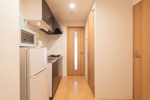 Family Apartment, Balcony, City View | In-room dining