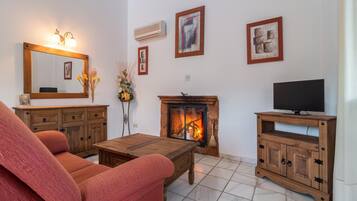 Smart TV, fireplace, foosball