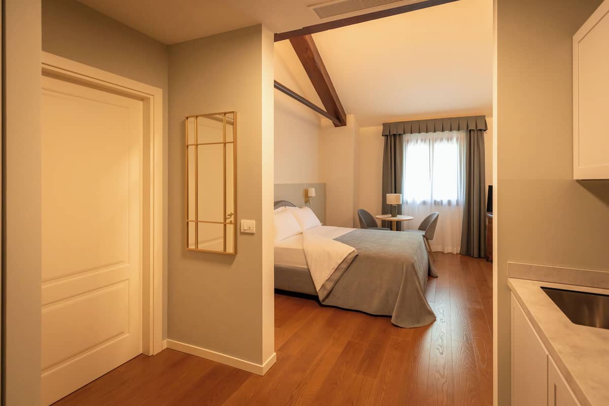 Standard Apartment | In-room safe, blackout drapes, soundproofing, iron/ironing board