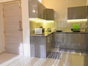 Fridge, microwave, stovetop, electric kettle