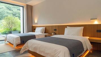 Signature Twin Room, Hill View | Down comforters, minibar, desk, laptop workspace