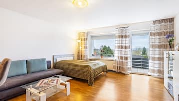 Tabla de planchar con plancha, wifi y ropa de cama