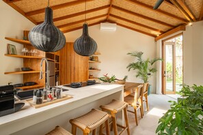 Deluxe Villa, Patio, Pool View | Private kitchen