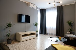 Leilighet – comfort, balkong, byutsikt | Oppholdsområde