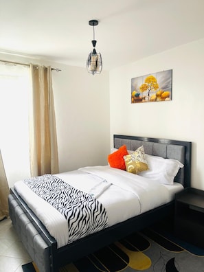 Cortinas blackout, tabla de planchar con plancha y wifi gratis